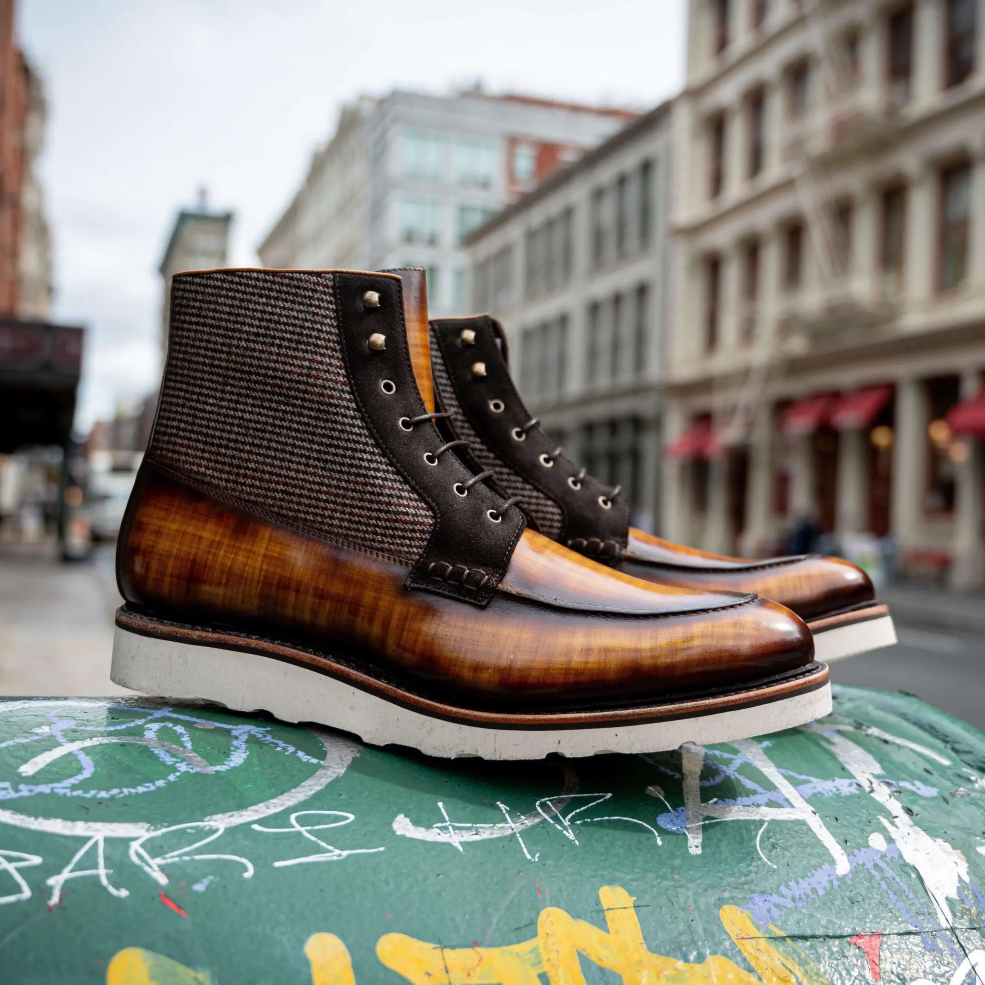 Brown leather and tweed boots.