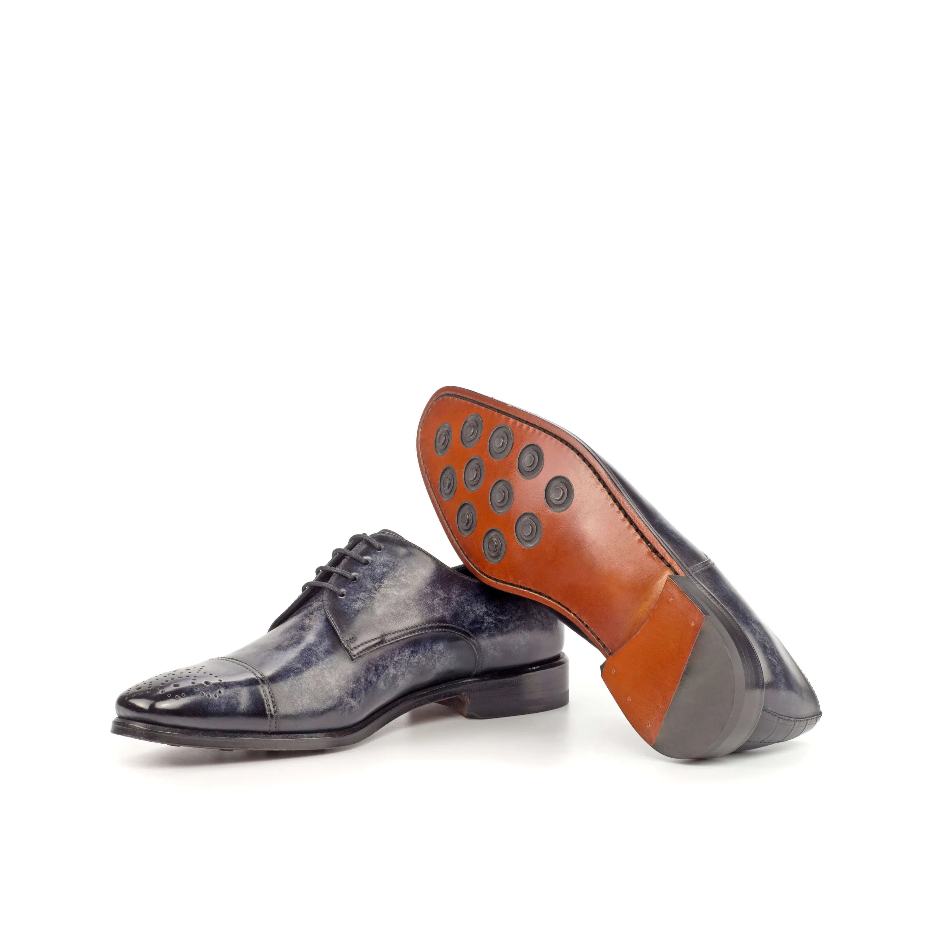 Pair of blue leather AL94 patina derby shoes