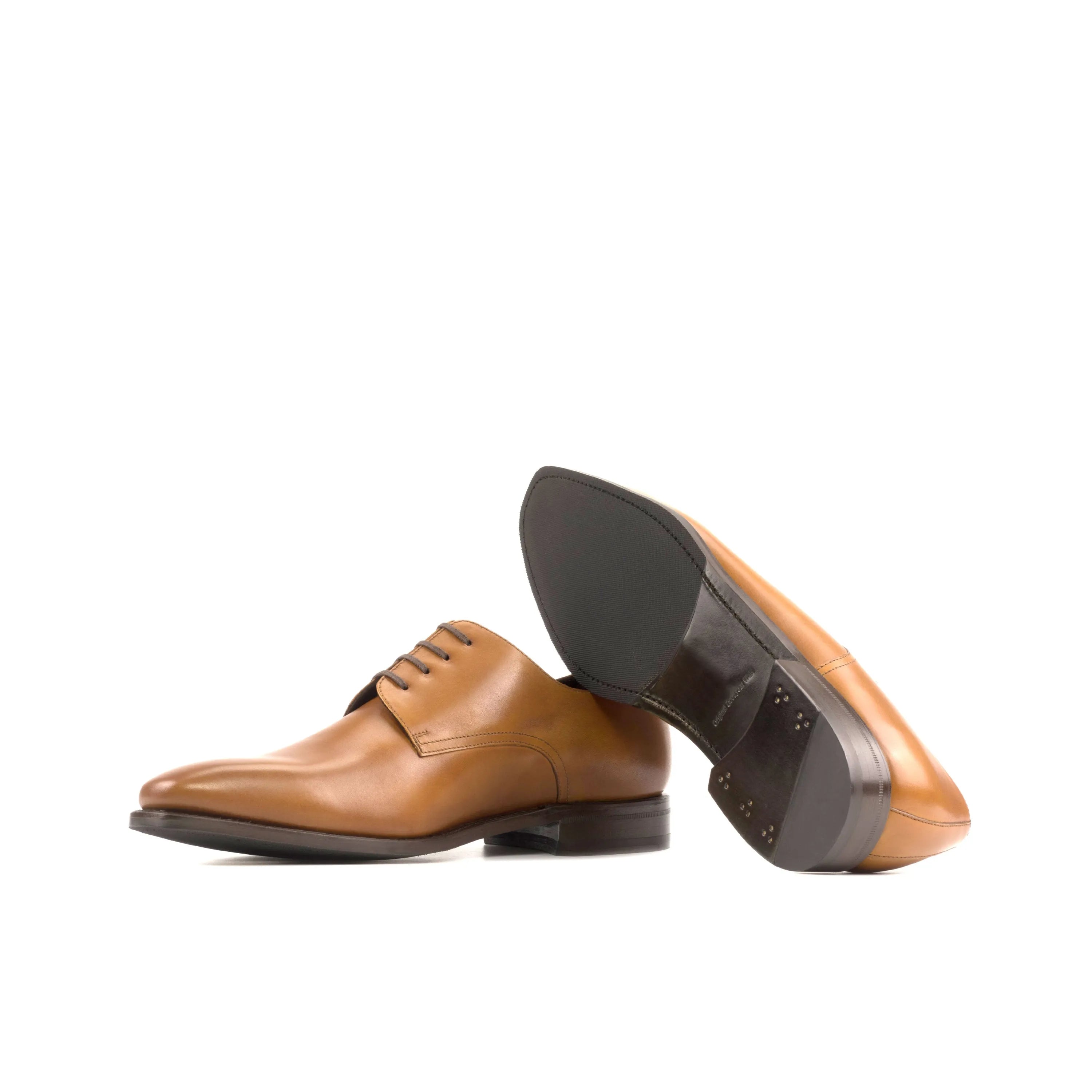Pair of tan Fiolo Derby shoes in fast lane style