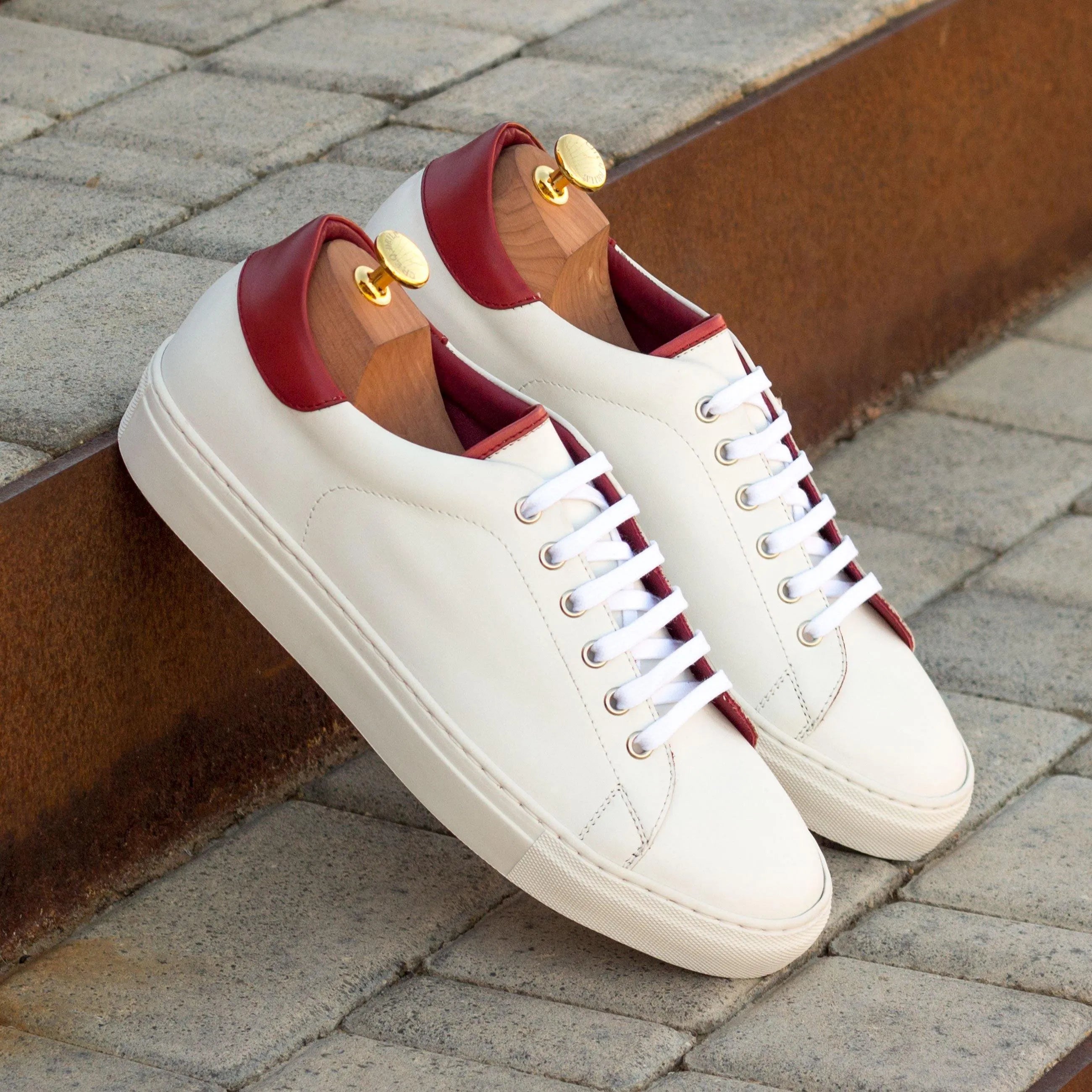 Fridays trainer sneakers: white leather chunky trainer sneaker with red accents