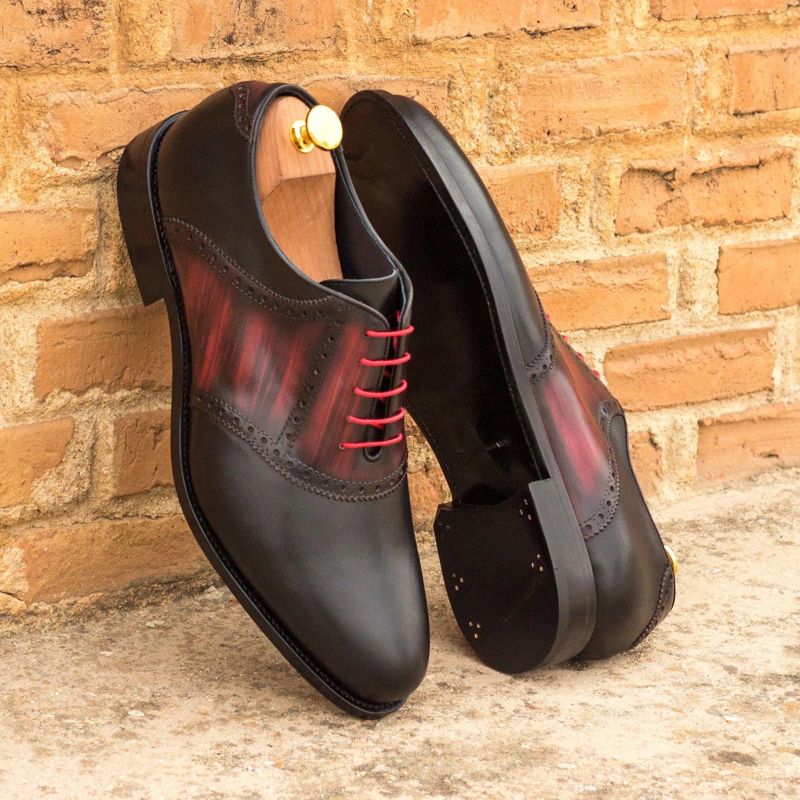 Jiovani saddle patina shoes in black and red leather