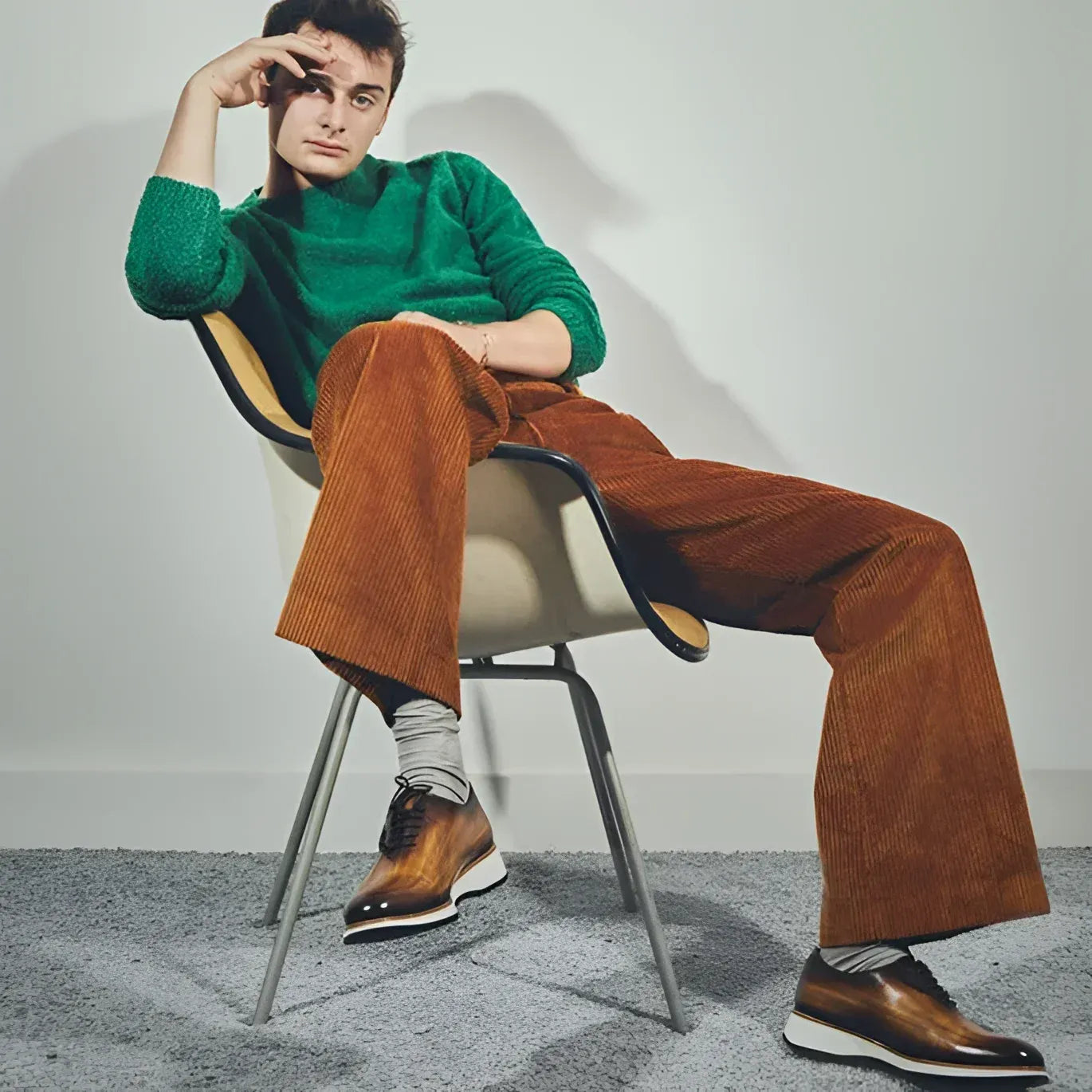 Man in green sweater wearing Lloyd wholecut patina shoes II