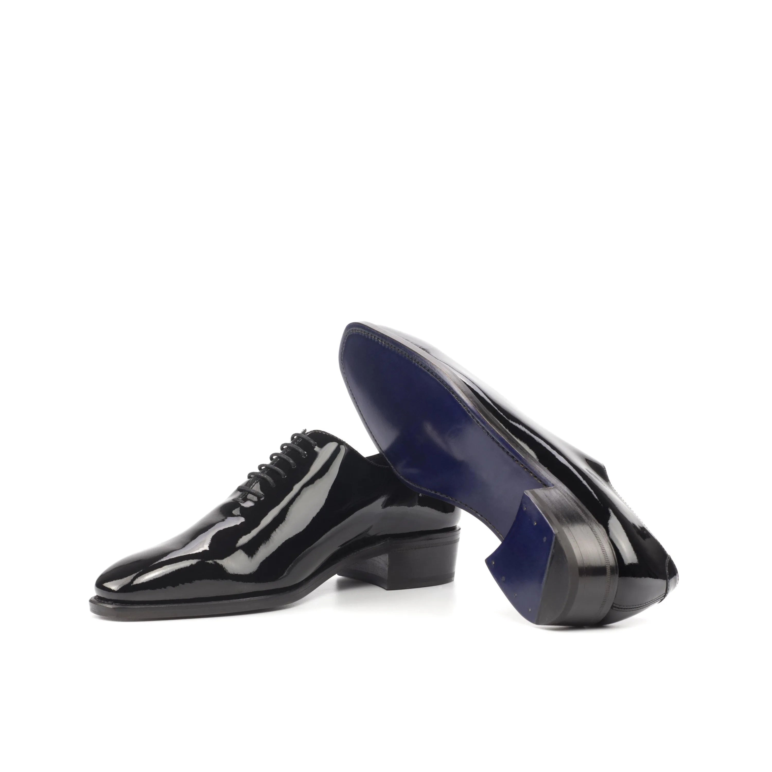 Pair of shiny black Proper Wholecut shoes