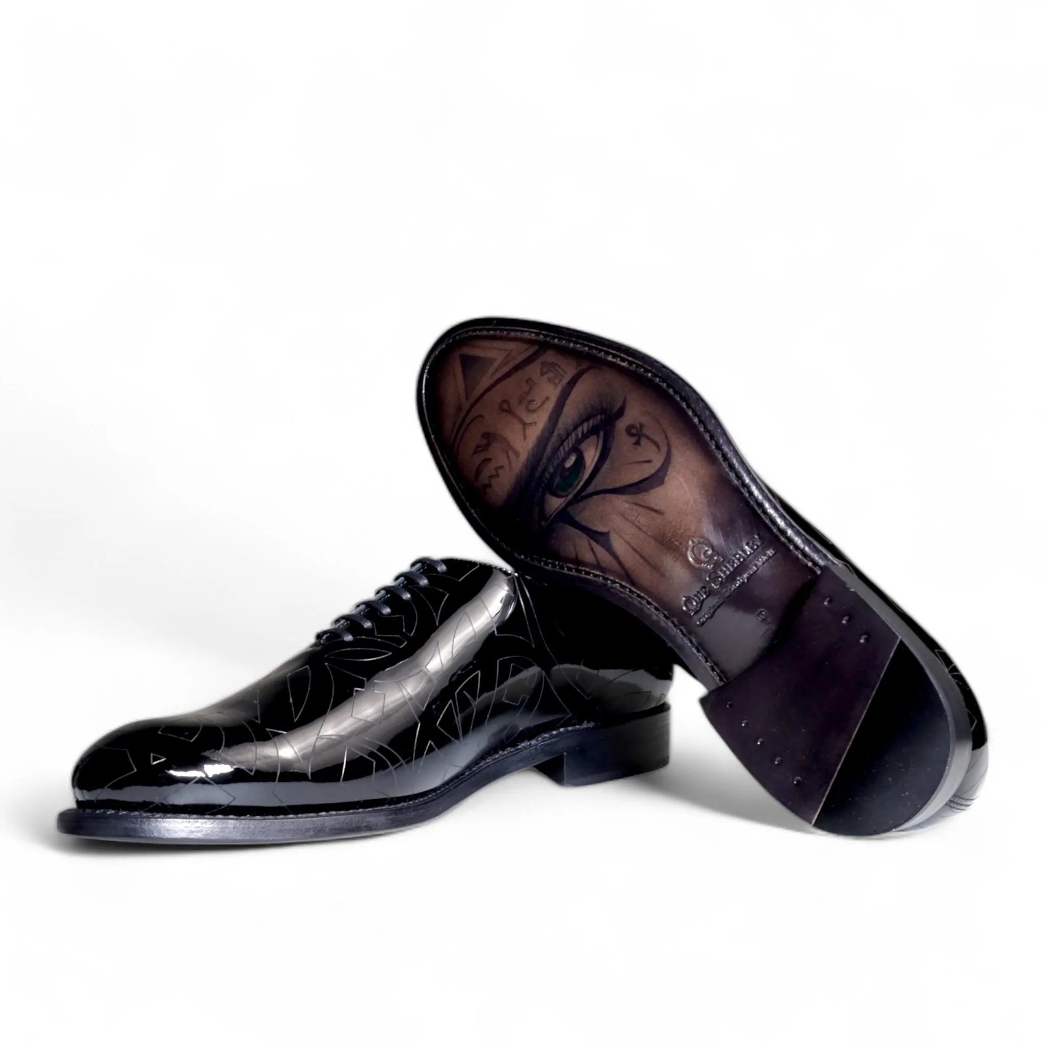 Quswa Noir premium Italian black wholecut shoes with eye design sole