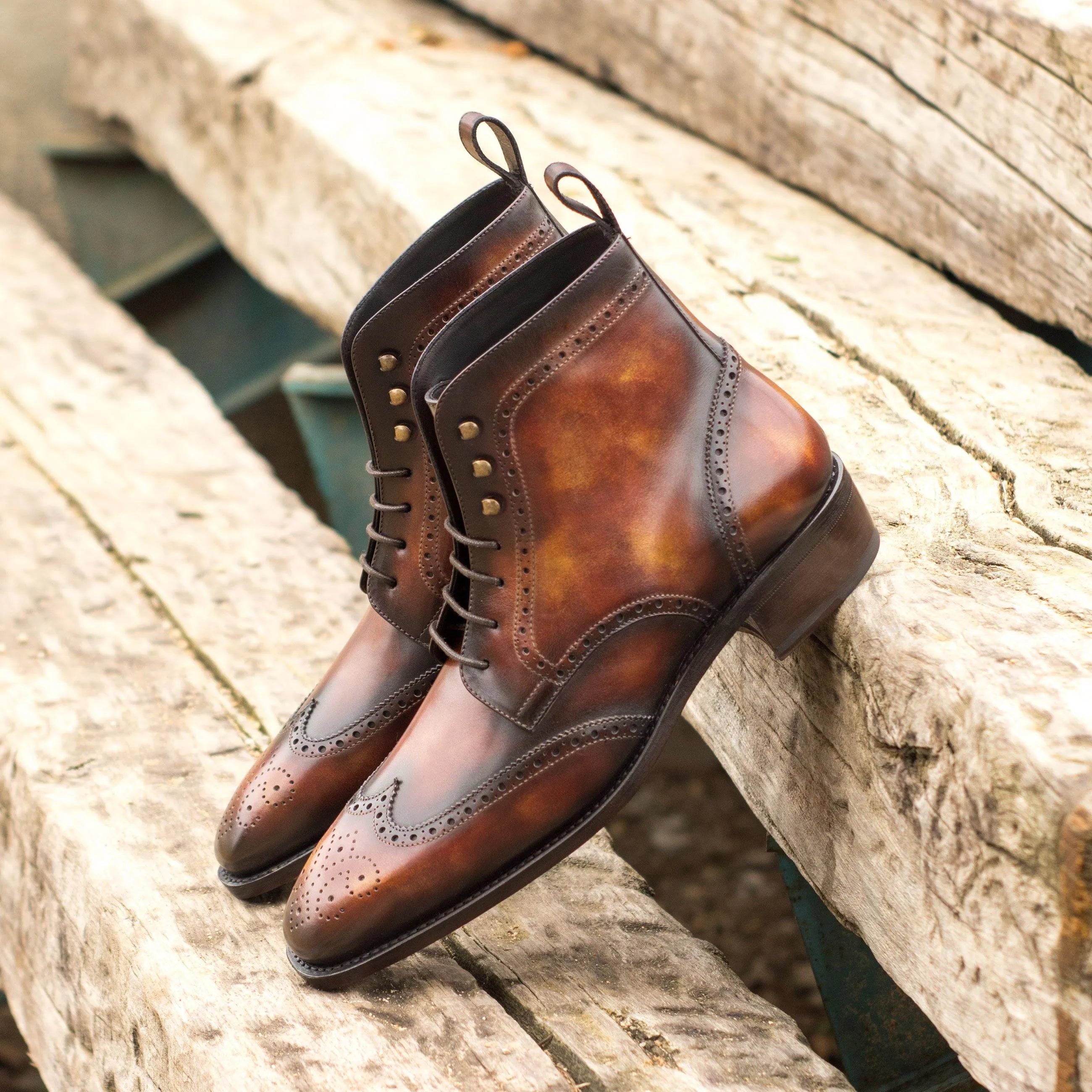 Silo Patina military brogue boots in brown leather wingtip design