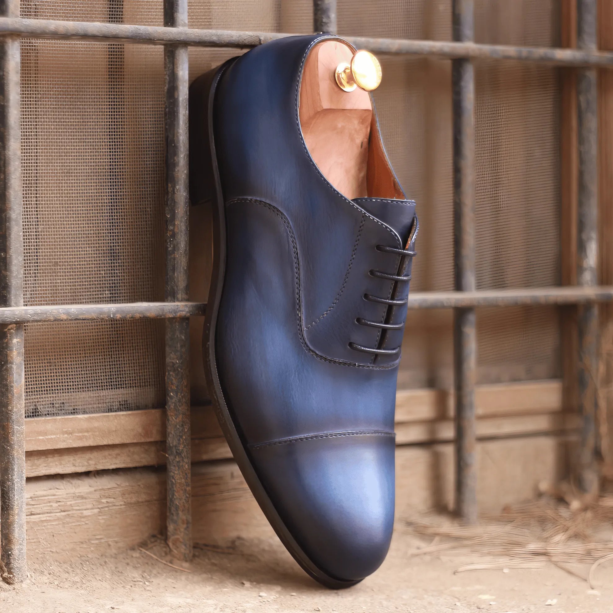 Blue 1939 Oxford patina shoes in leather back view