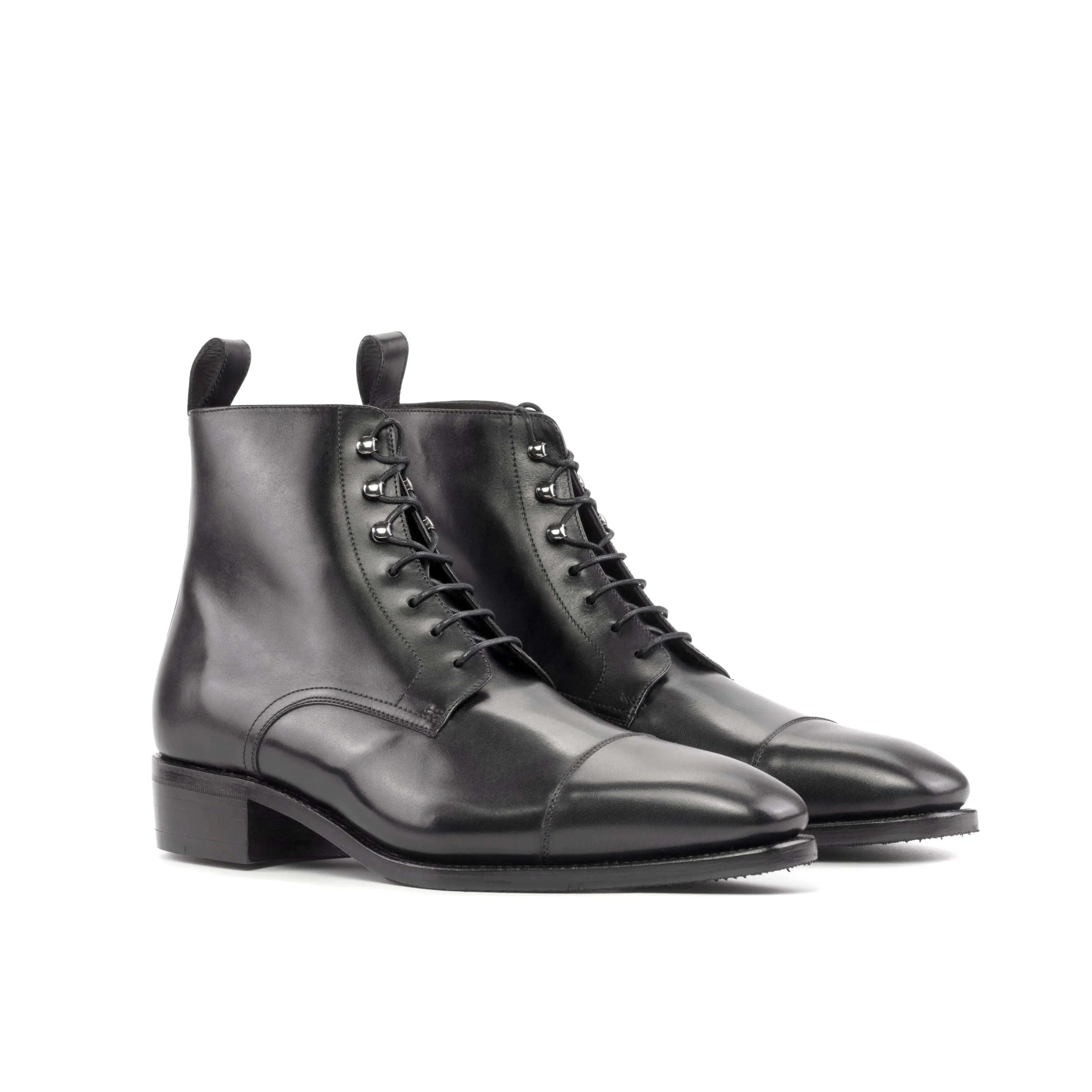 Pair of black leather lace-up 1955 Jumper Boots back view