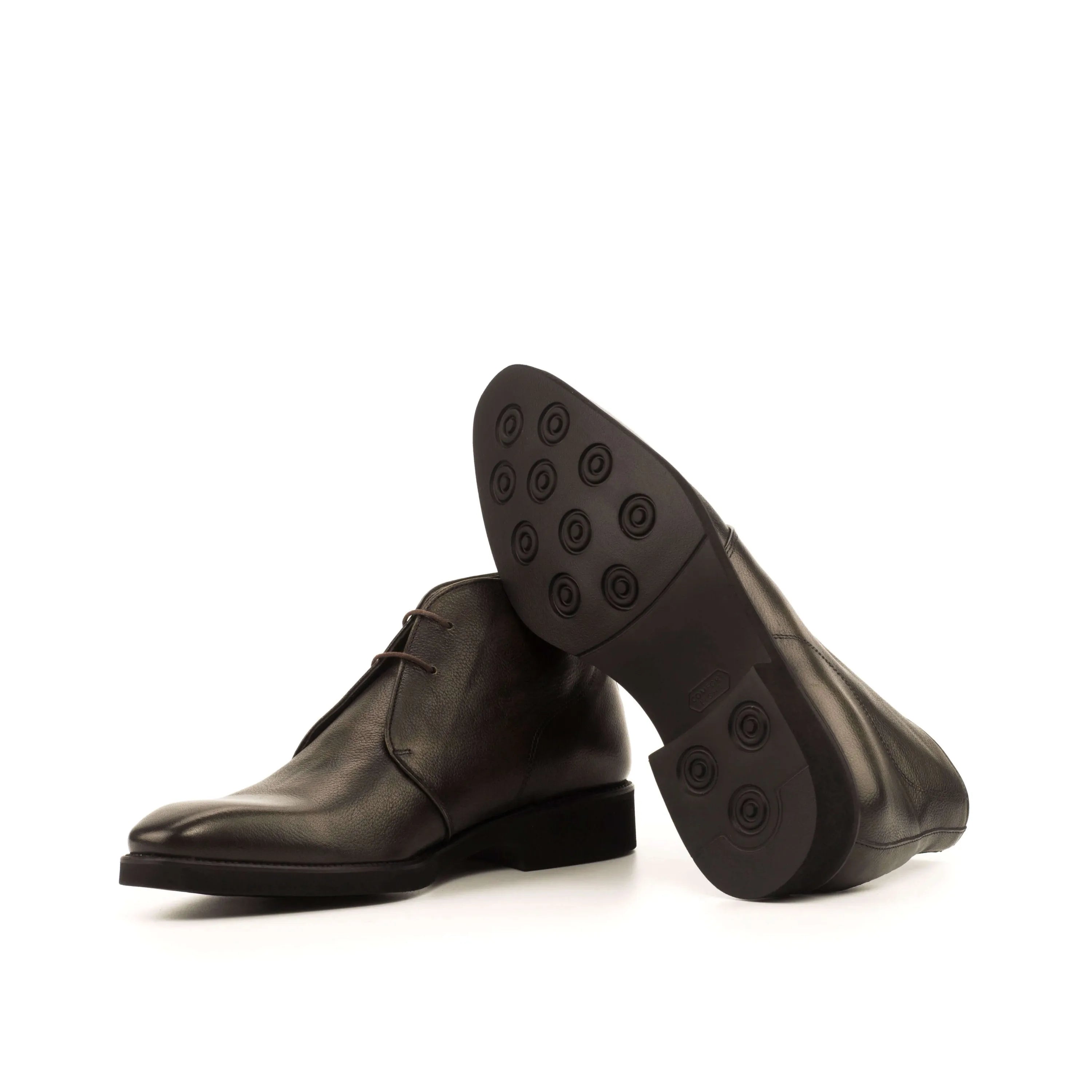 Pair of dark leather Chesmu Chukka boots