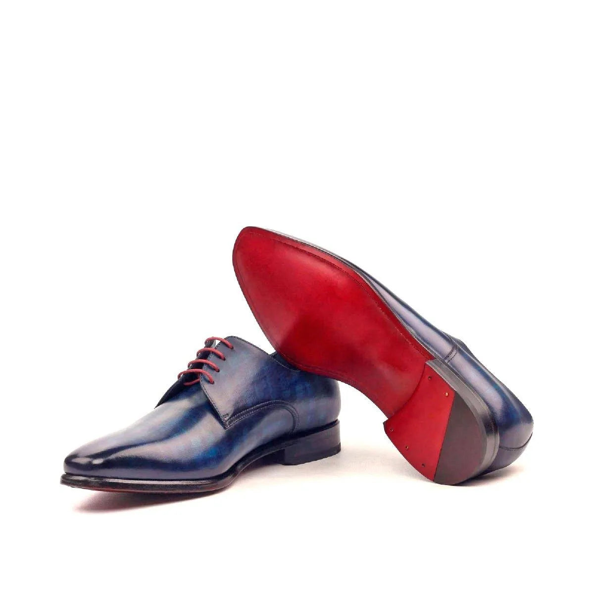 Cruz Patina Derby shoes in blue leather with red soles
