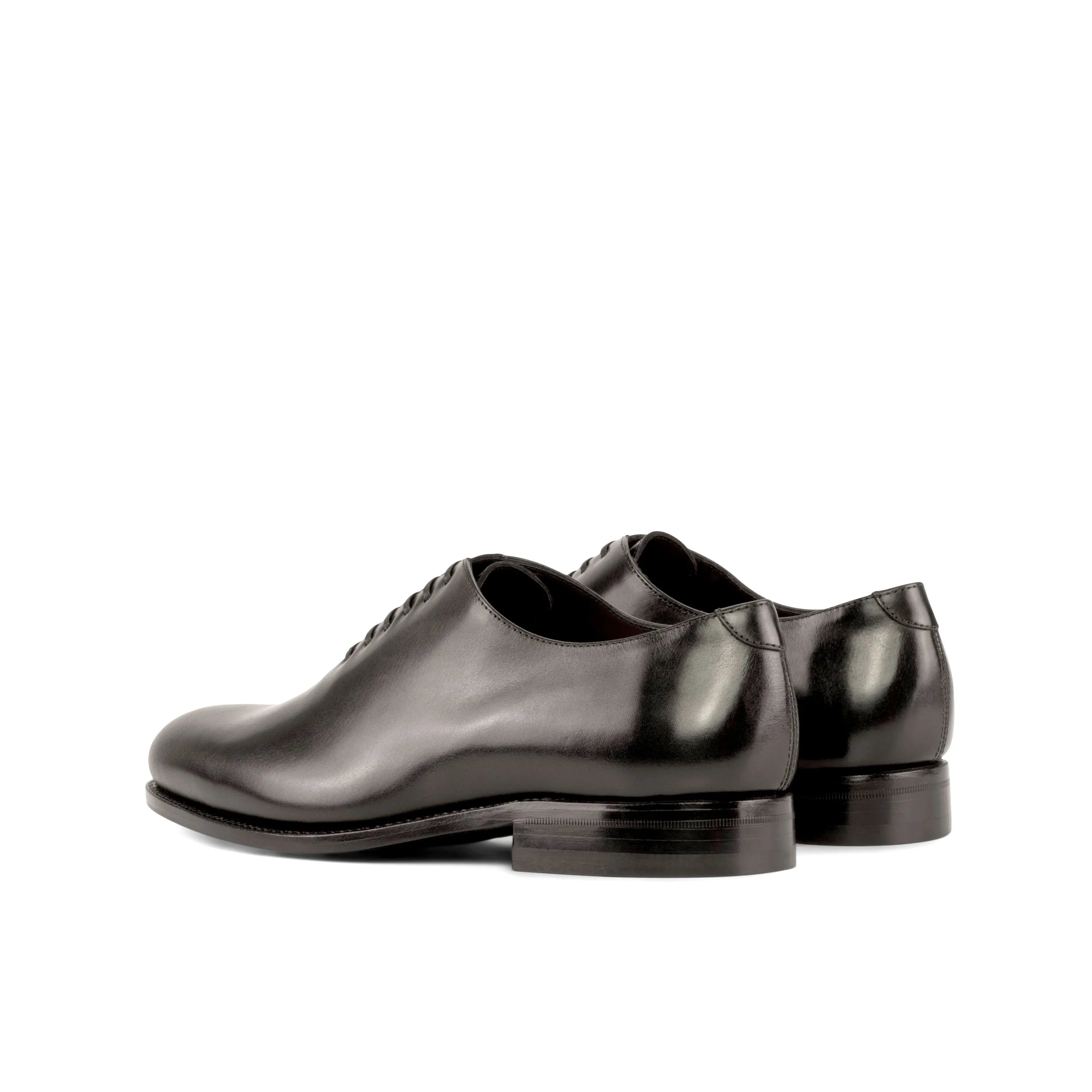 Pair of black leather Hans Wholecut shoes