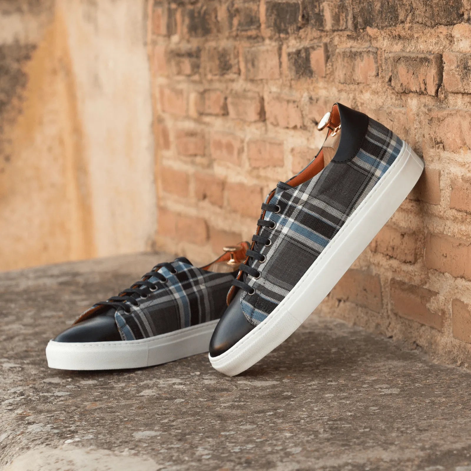 Pele trainer sneaker in plaid leather with cupsole design