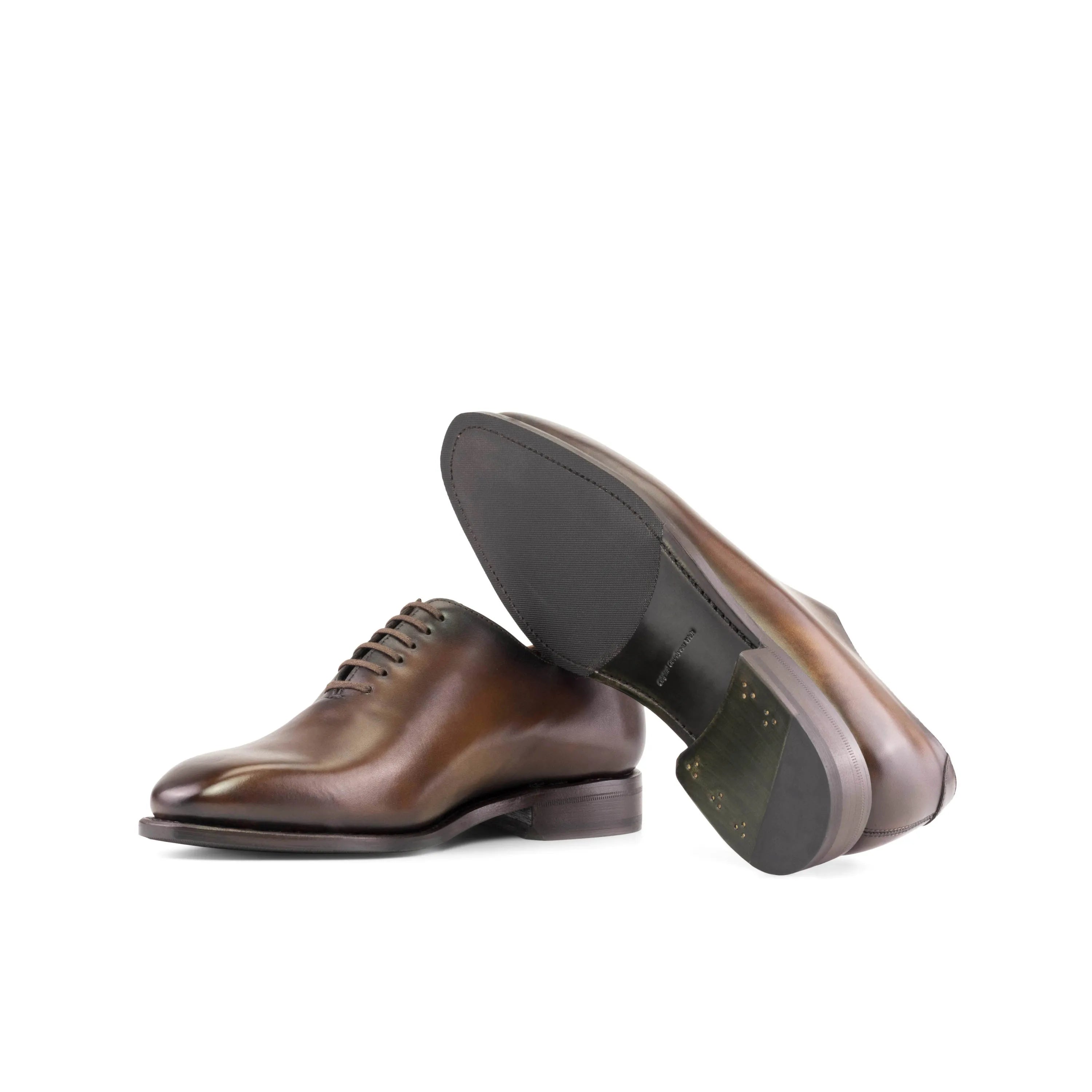 Pair of brown leather Renzo Wholecut shoes