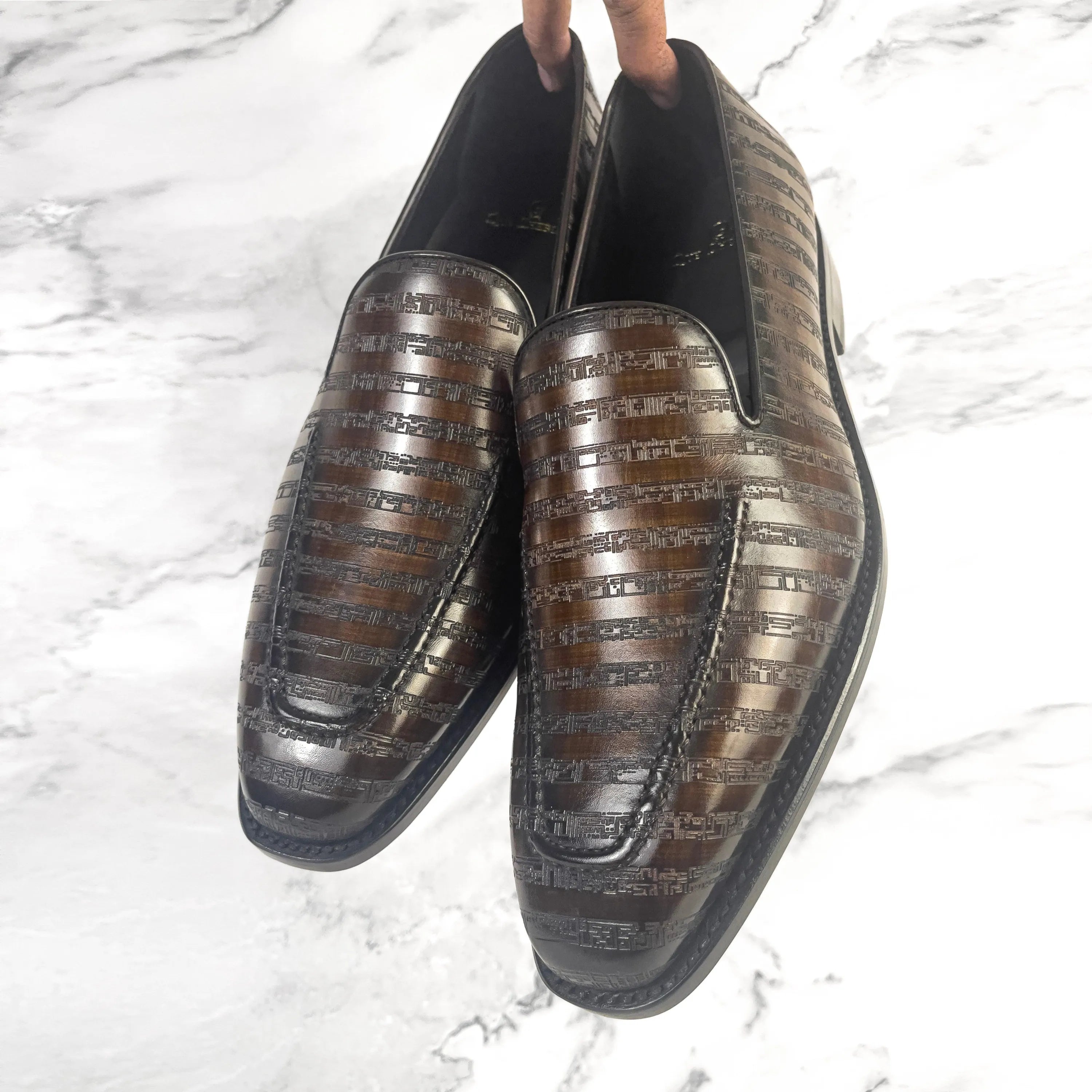 Pair of Poet VIII Patina brown leather loafers with leather art sole