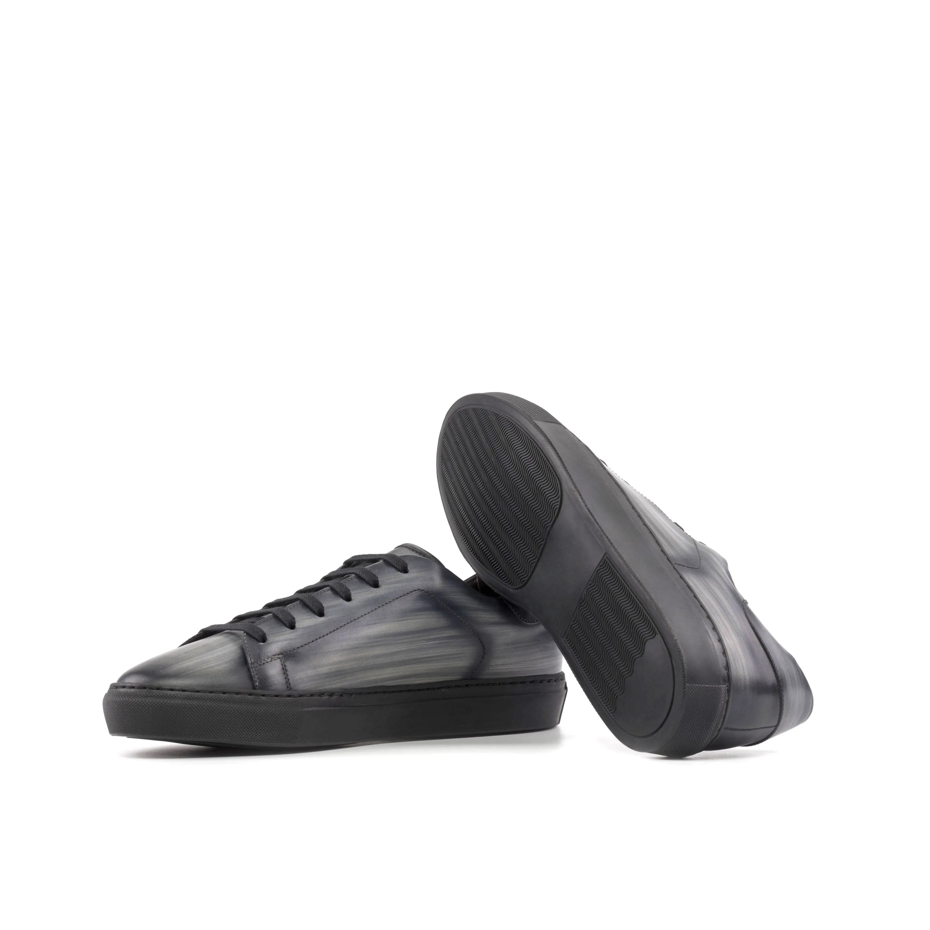 Pair of black leather Verve Trainer Patina cupsole trainer sneakers